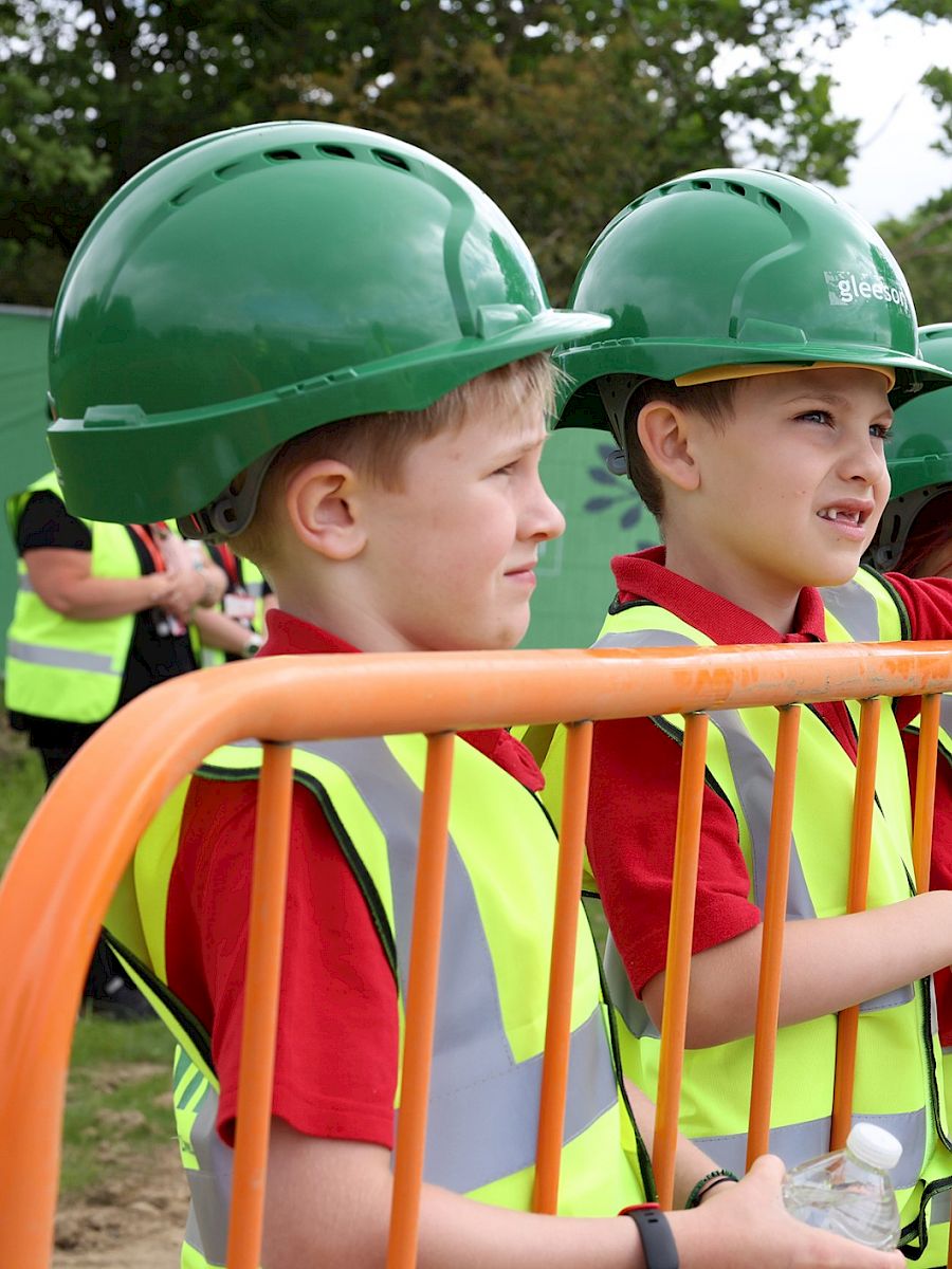 School children in PPE on site visit.