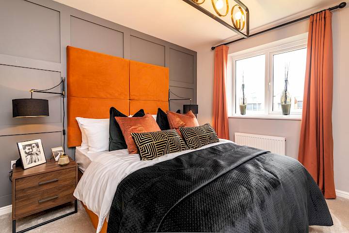 Orange and grey decorated Gleeson bedroom